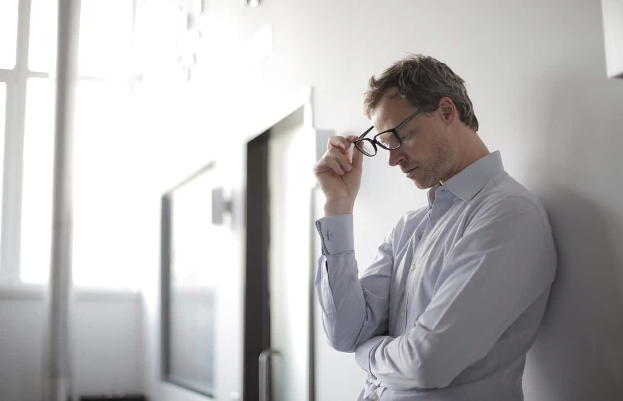 photo-of-man-holding-black-eyeglasses-3760137