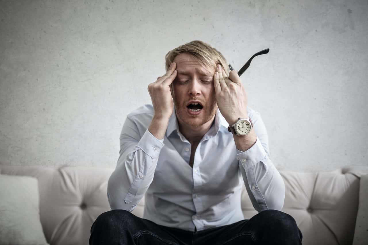 photo-of-man-touching-his-head-3752834