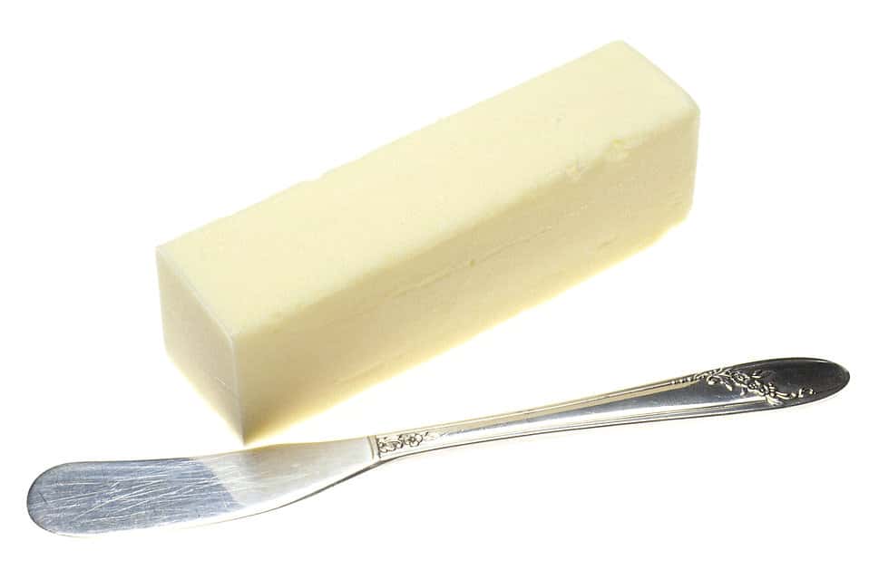 17303-a-stick-of-butter-with-a-butter-knife-pv