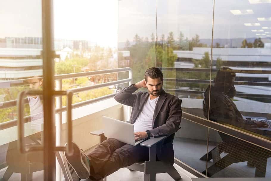 confused-man-working-laptop-tablet-techonology