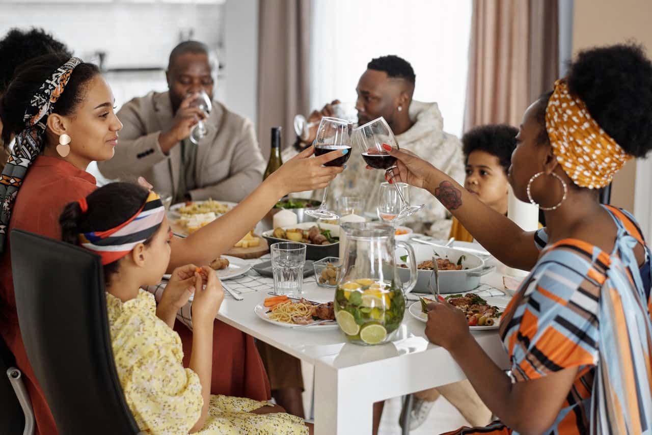 family-having-dinner-and-celebrating-4262173