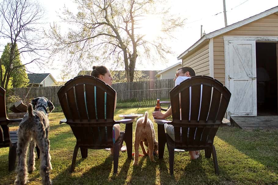 man-and-woman-sitting-on-chairs