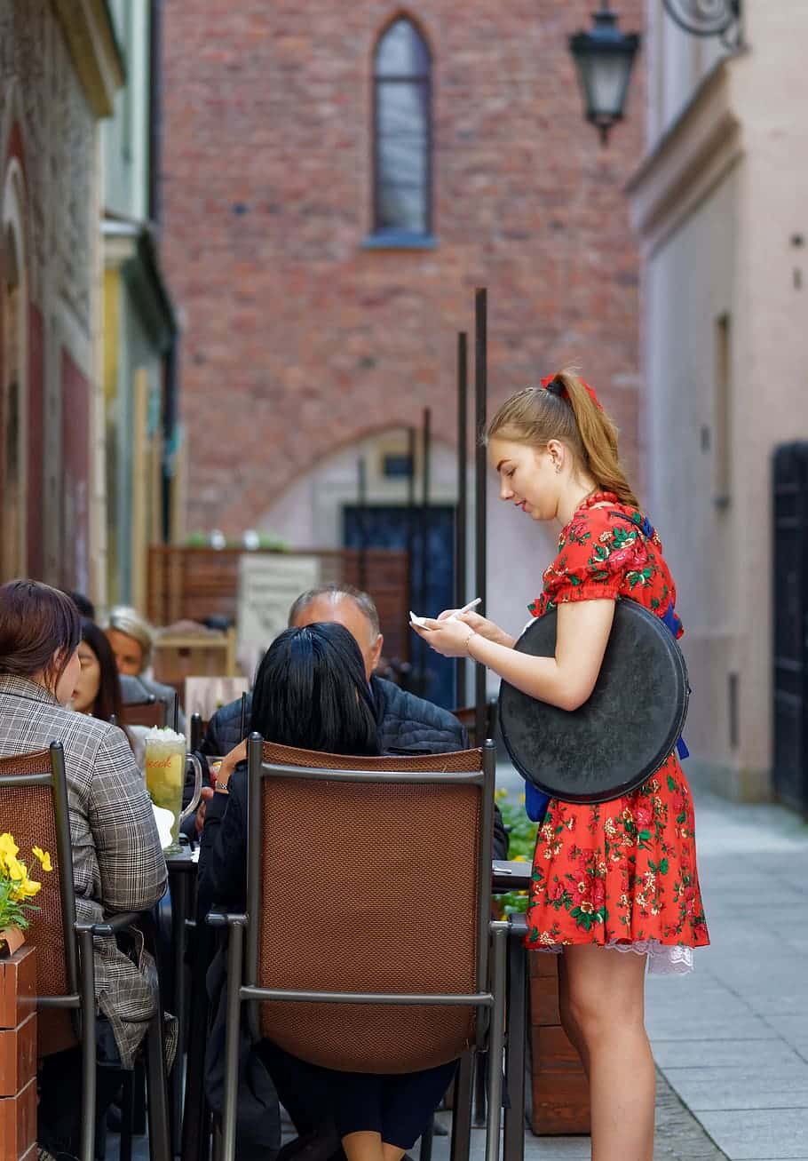 people-tourists-terrace-restaurant-order-the-menu
