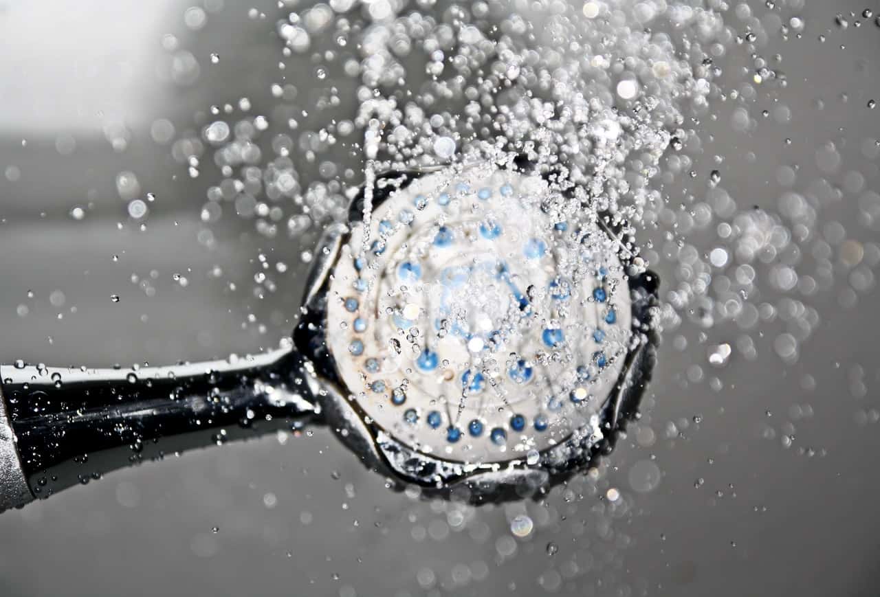 black-shower-head-switched-on-161502