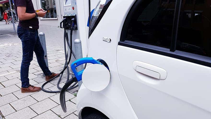 electric-car-charging-station-electric-cable-recharge-terminal-man-pay-automatic