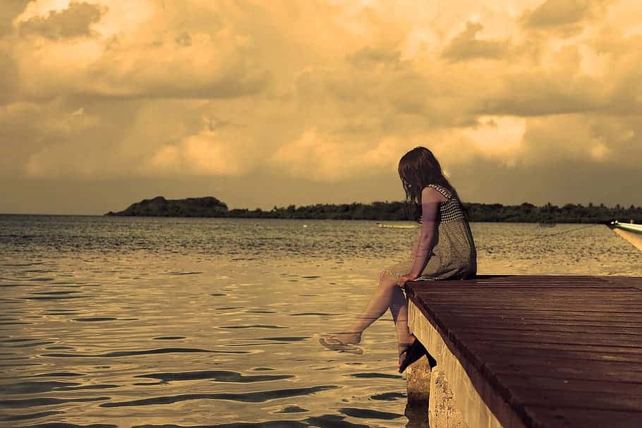 lonely-girl-lake-sepia