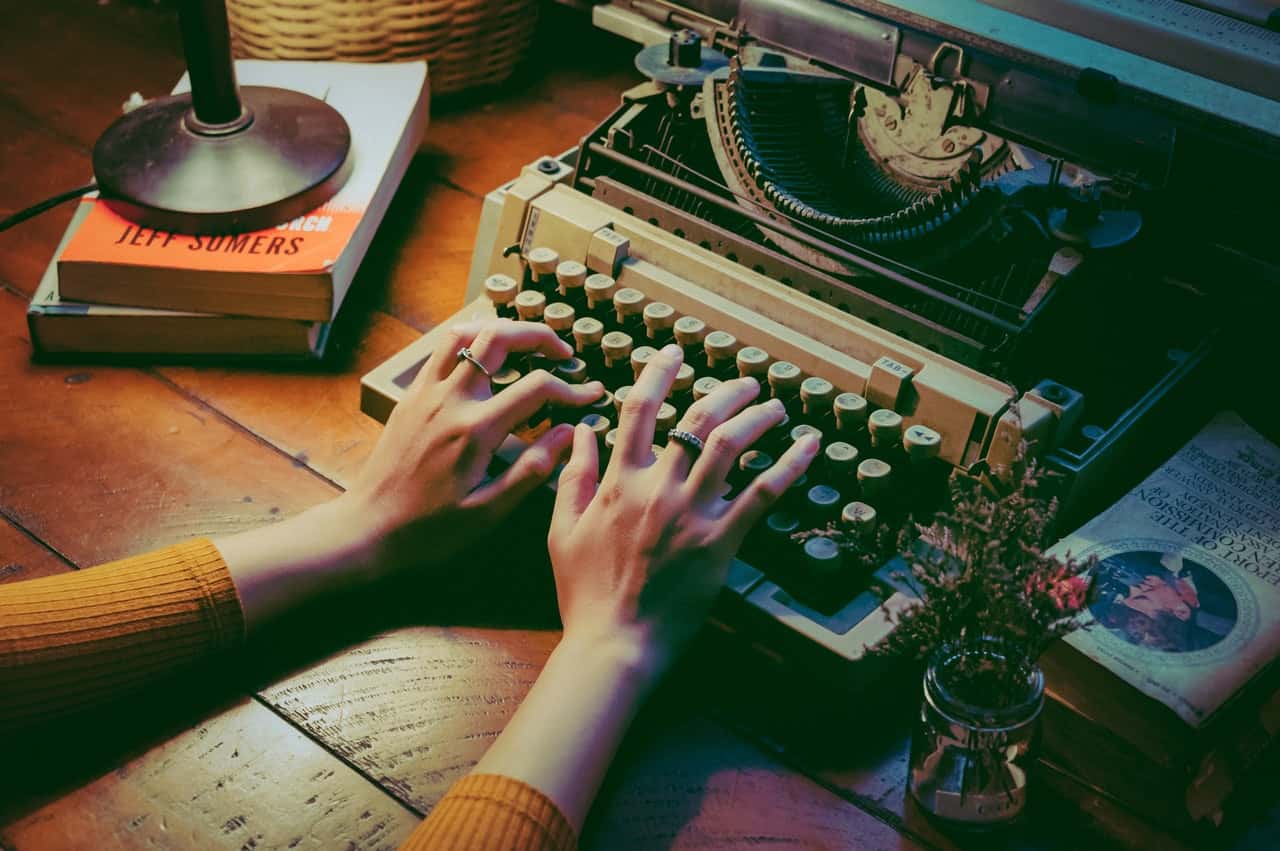 person-using-typewriter-1448709