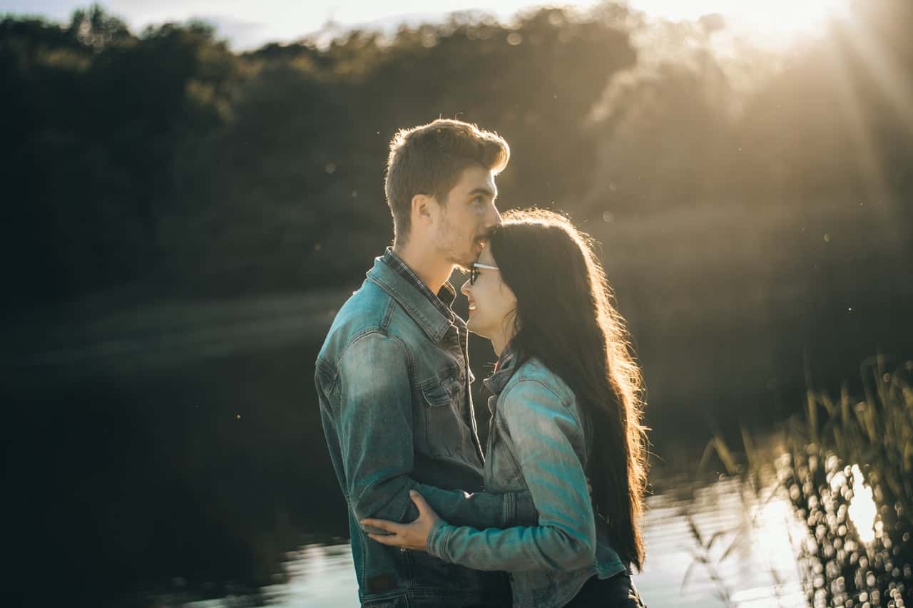 photo-of-man-kissing-woman-s-forehead-2536578