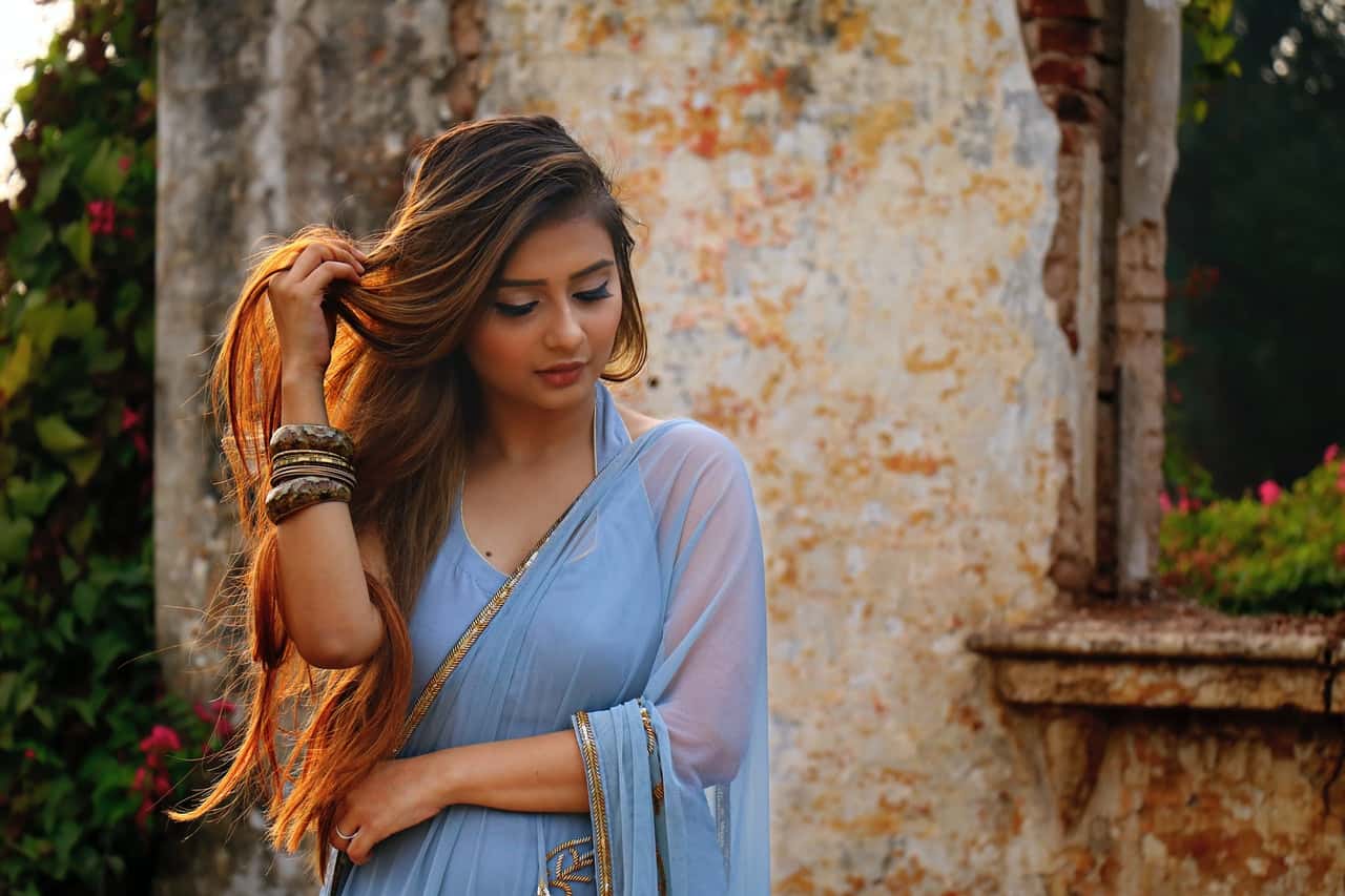 photo-of-woman-wearing-blue-dress-1193942