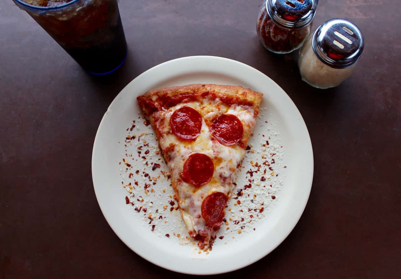 sliced-pepperoni-pizza-on-white-ceramic-plate-708587