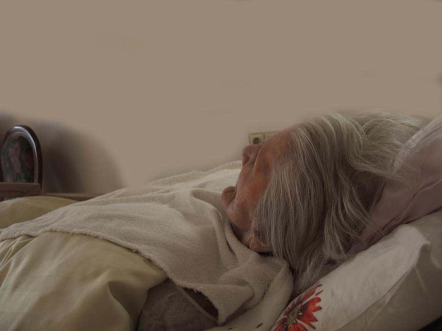 woman-old-bed-concerns-dependent-dementia-age-alzheimer-s-retirement-home
