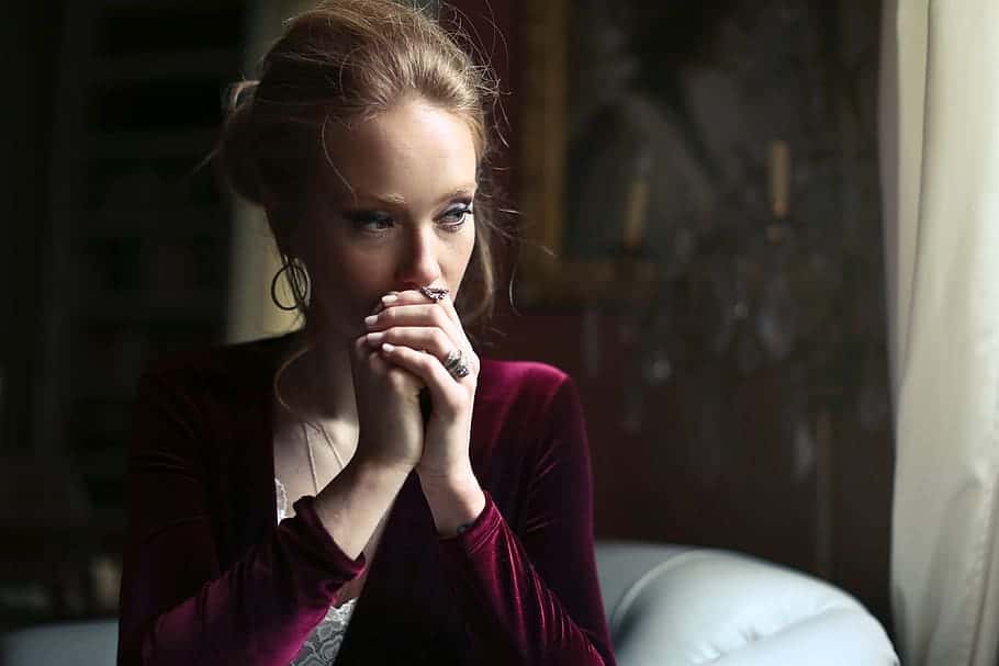 elegant-woman-deep-thought-thinking-concerned-hands