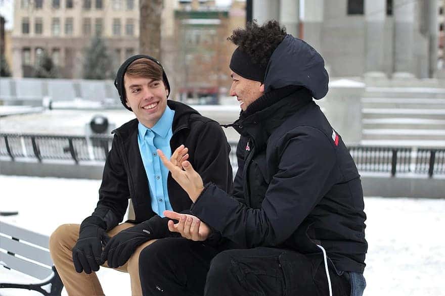friends-male-men-outside-winter-cold-bench-conversation-smile