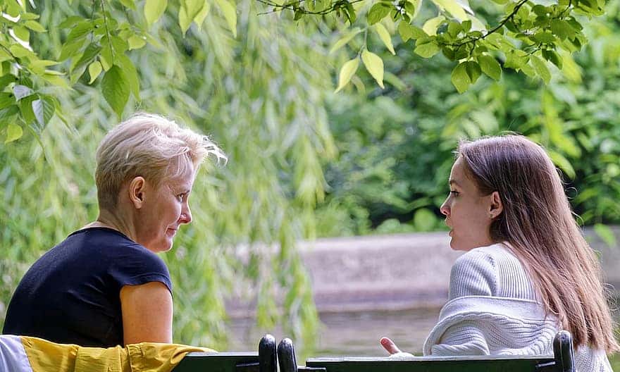 people-women-mother-daughter-talking-care-bench-nature-park
