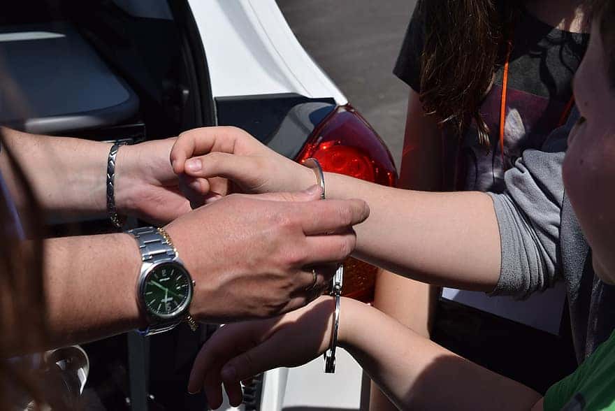 police-emergency-handcuffs-hands-arrest