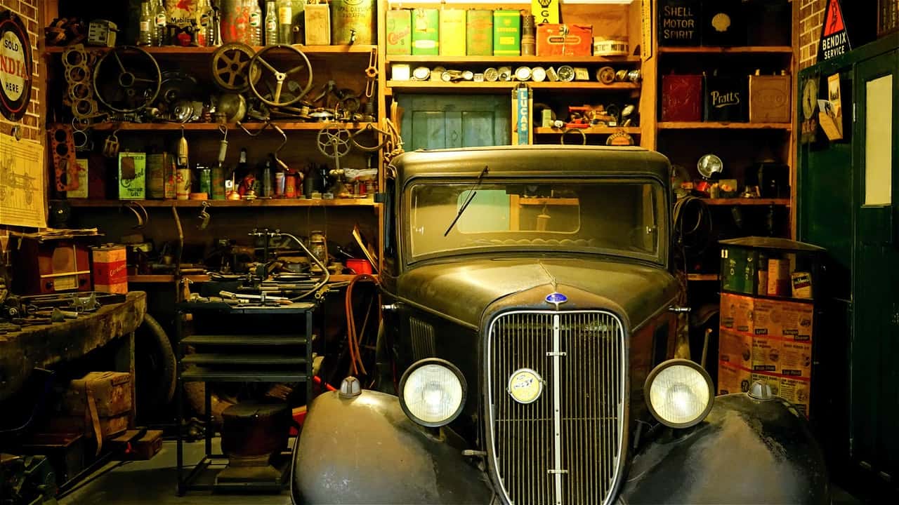 Car getting serviced in a garage